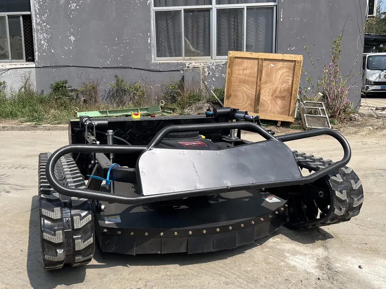 Black tracked mower for steep terrain